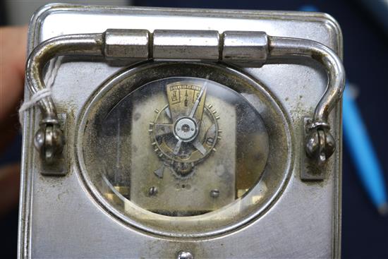 A French silvered brass carriage clock and a similar timepiece